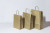 Draagtassen Papier Goud 18+8x22cm Kraft Papier 90 grams (50 stuks) [PAM1822GO]